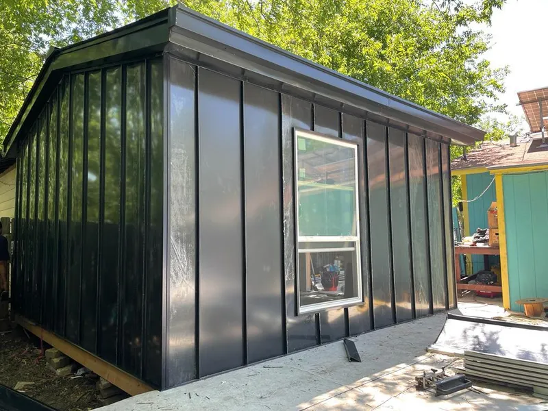 Black standing seam metal wall panels for Roof Inspection in Grosse Pointe Woods