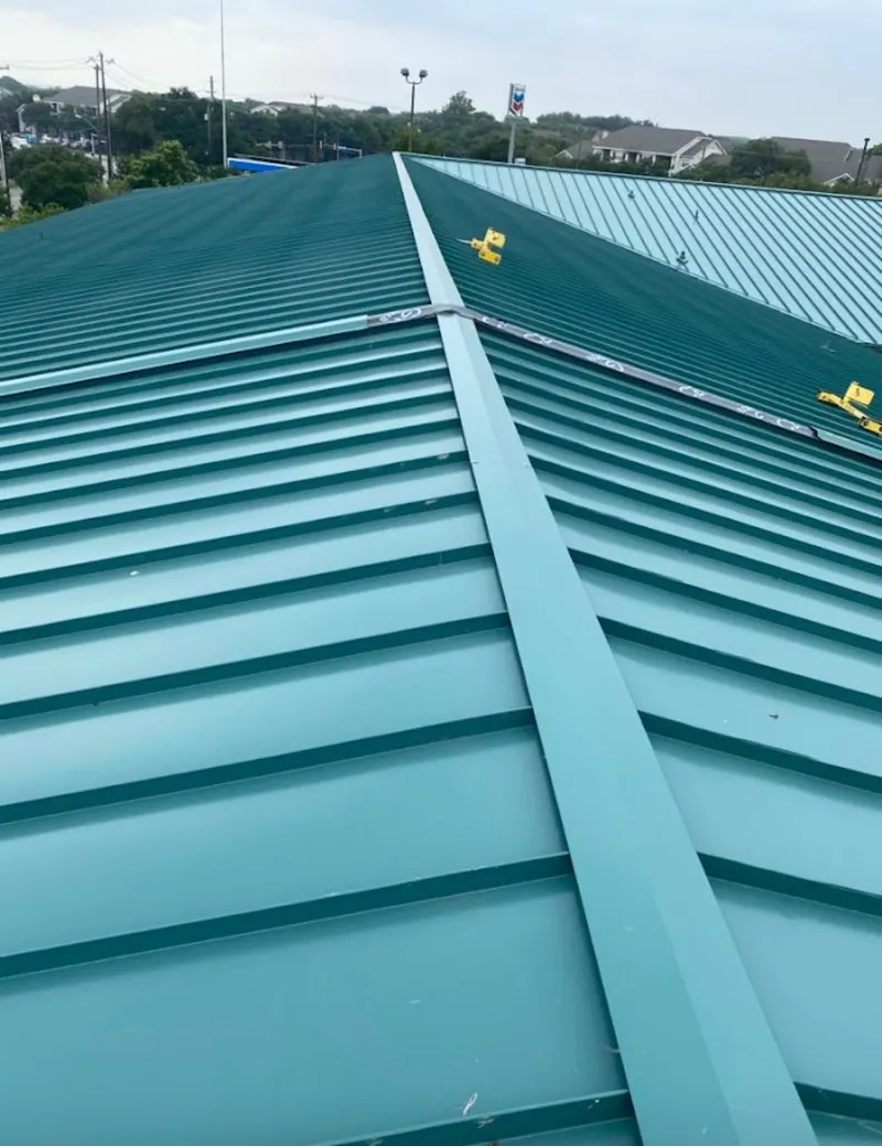 Green commercial metal roof ridge and valley for Metal Roof Repair in Grosse Pointe Woods