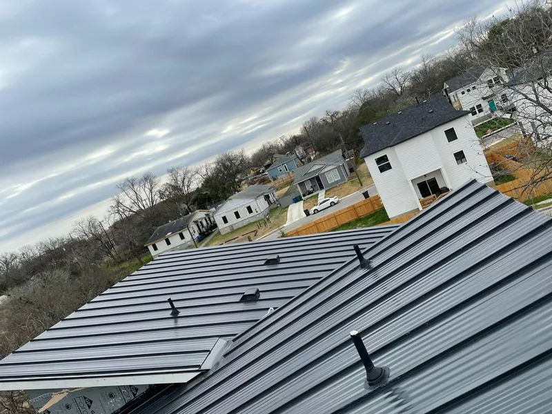 Standing seam metal roof panels with vents for Skylight Repair in Grosse Pointe Woods